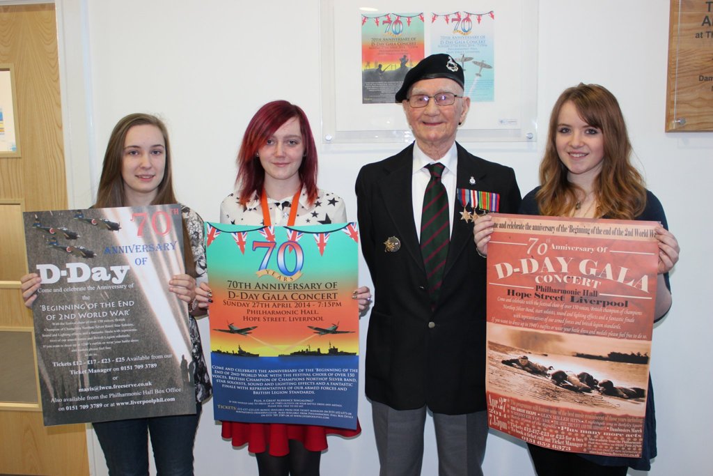 Image of War Veteran Presents Prizes for College Competition to Design D-Day Gala Poster